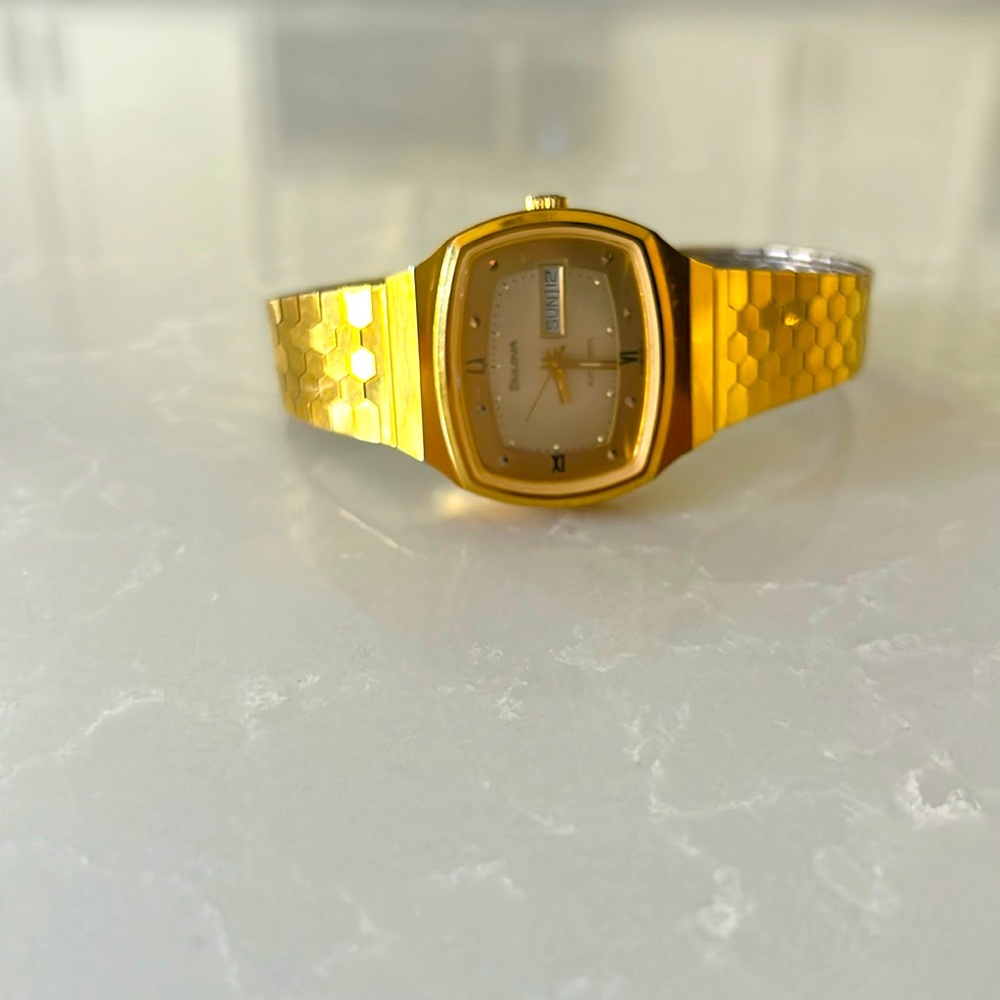 Vintage Bulova stainless steel water resistant gold watch